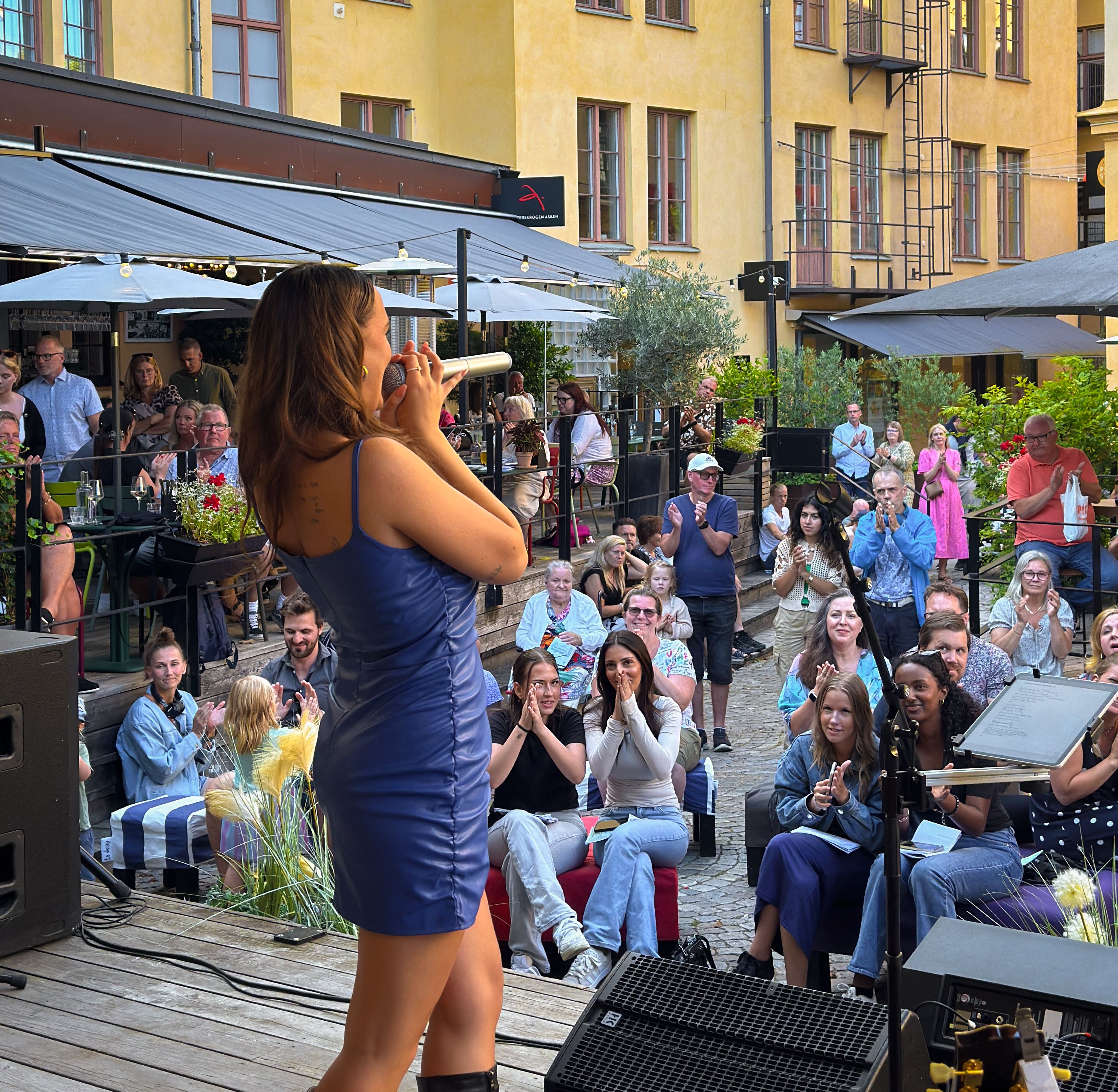 Girl singing on stage