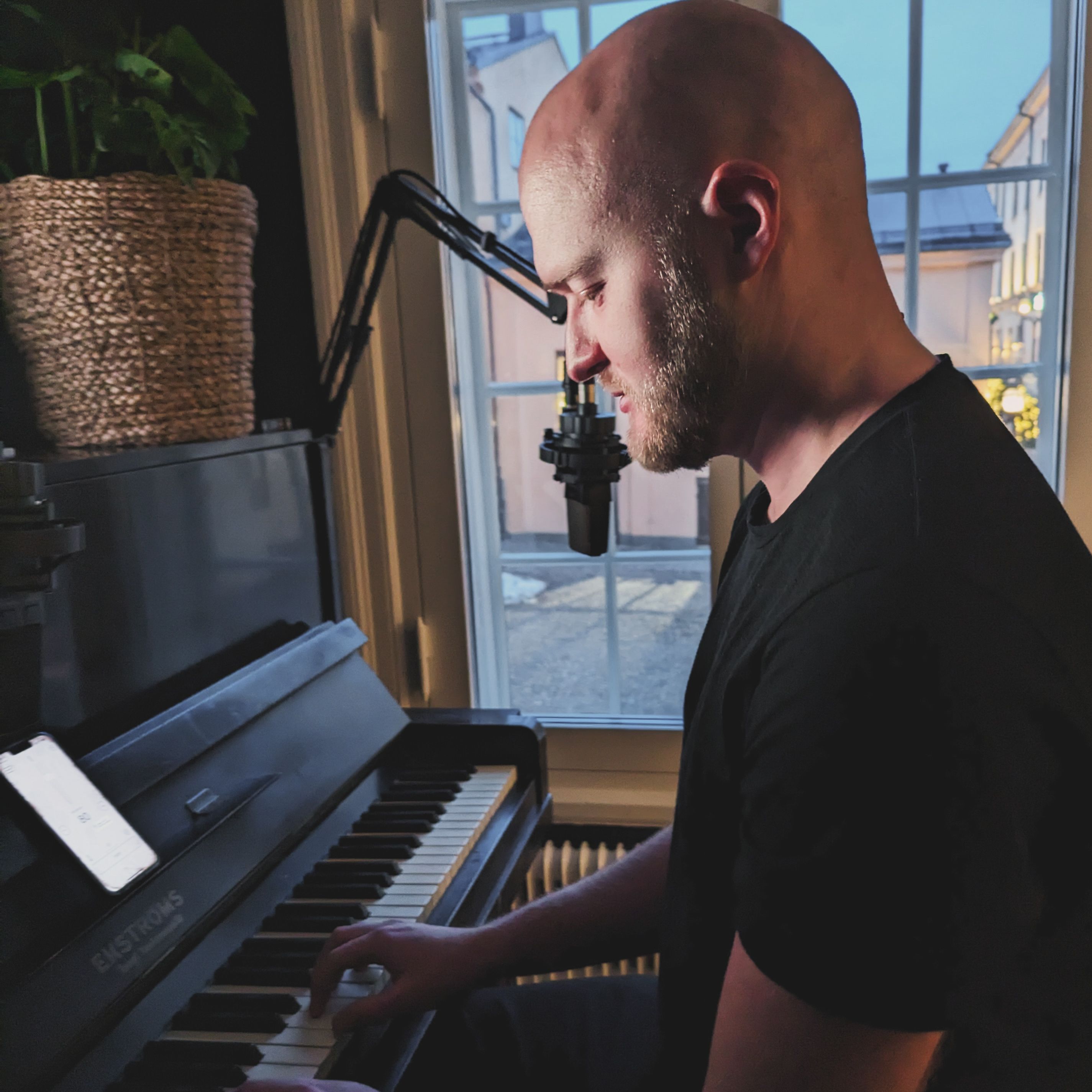 Guy playing piano